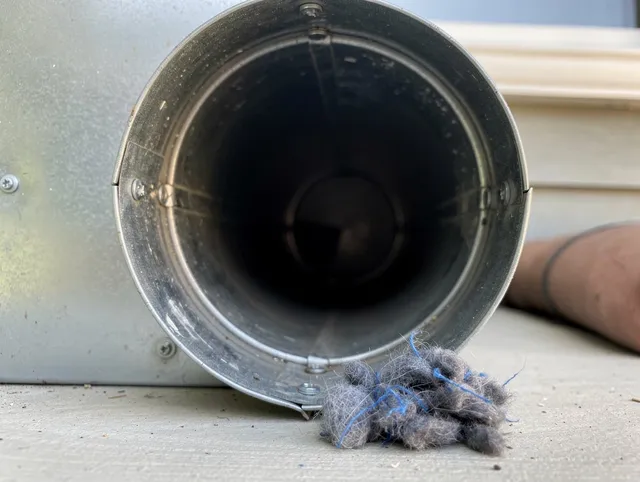 Jerome Dryer Vent Cleaning technician using specialized equipment to clear severe dryer vent blockage in Jerome